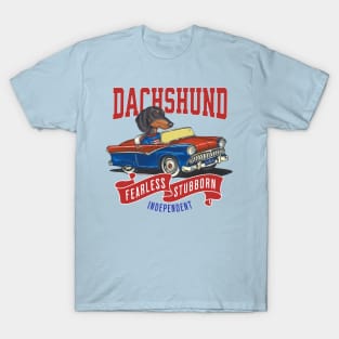 Funny and Cute Doxie Dachshund dog in a classic vintage retro car with red white and blue banner flags T-Shirt